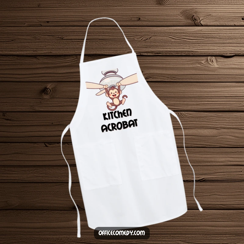 Funny apron with a monkey swinging from a ceiling fan blade, adding whimsical humor to cooking and baking.