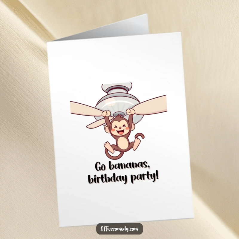 Funny free printable birthday card featuring a playful monkey swinging wildly from a ceiling fan blade.